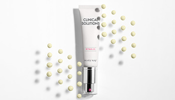 Photo of Clinical Solutions™ Retinol 0.5 with pea-sized drops of the formula.