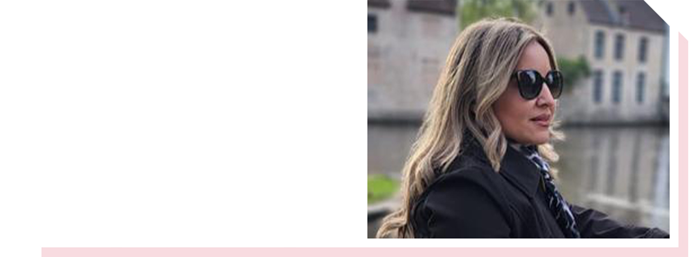 Image of woman outdoors wearing sunglasses