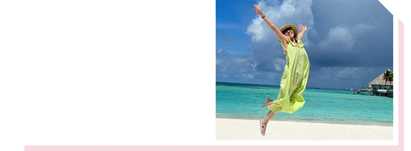 Image of Bibi jumping at the beach