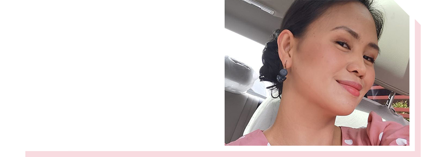 Image of woman looking at camera from the side