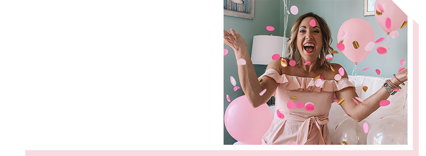 Image of woman in dress throwing confetti