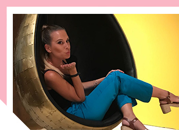 Image of woman blowing a kiss