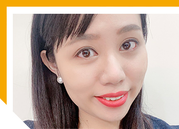 Closeup image of a woman with a slight smile