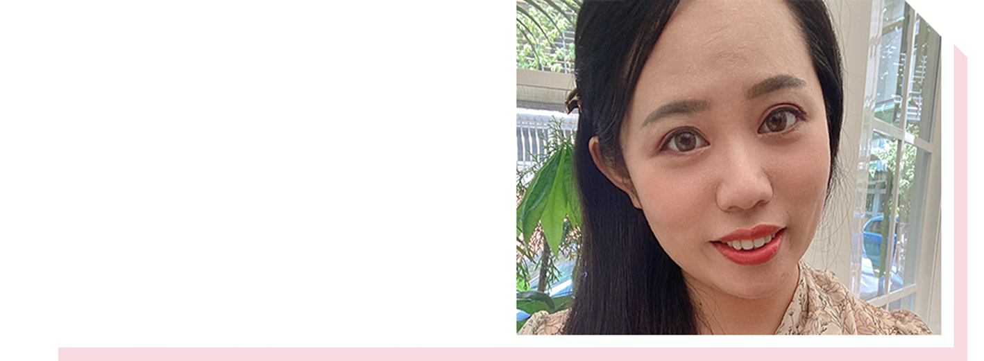 Closeup image of a woman with a slight smile