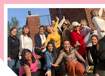 Image of women smiling and happy