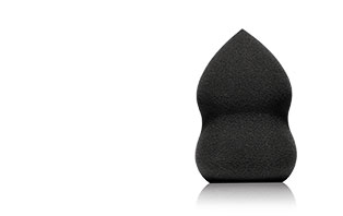 Shop now for the NEW Blending Sponge from Mary Kay. Helps to create a seamless and even application of makeup. Makes a great gift! A black blending sponge is displayed in the right corner.