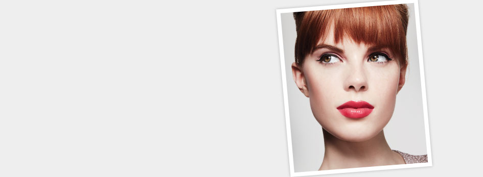 Get the step-by-step application tips for the Sweet Pinks Look created by Mary Kay Guest Makeup Artist Sam Addington. A young red head is seen staring at the top left corner. She is wearing pink eye shadow and red lipstick.