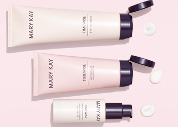 TimeWise Miracle Set daytime routine including a cleanser, moisturizer and SPF product shown on a light pink background