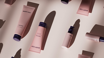 TimeWise Miracle Set laying flat on a pale pink background with dim lighting that alludes to nighttime