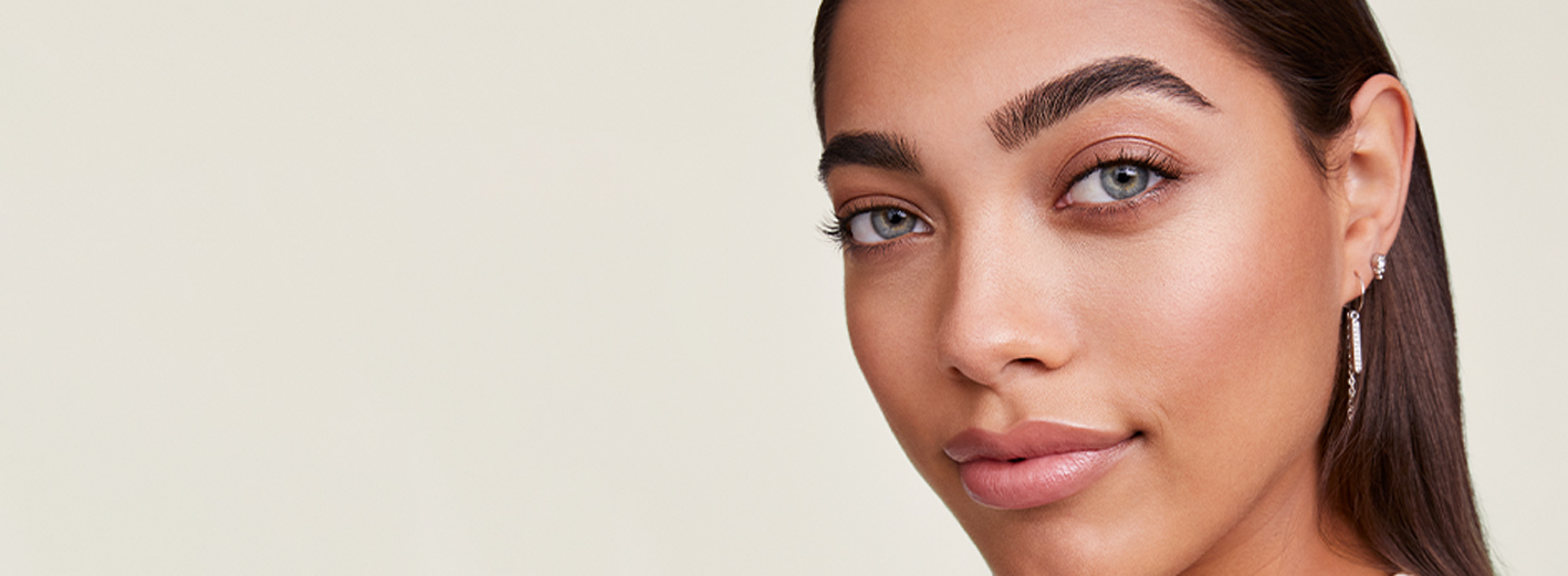 Model with medium skin tone and brown hair