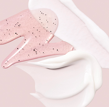 Artistic smears of exfoliating Mary Kay skin care product.
