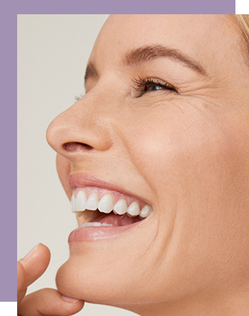 A smiling mature white woman with blonde hair