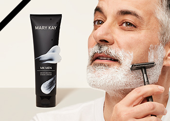 A mature man shaving his beard pictured next to MKMen Moisturizing Shave Cream