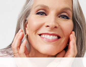 Colour for Life Chooser with an older lady smiling with natural makeup  and grey hair