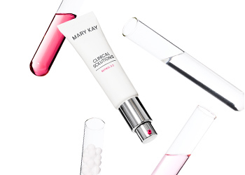 product and test tubes with pink liquid floating