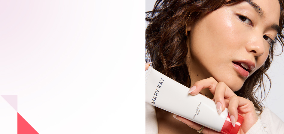Woman holding Mary Kay® Hydrating Cream Mask against her face