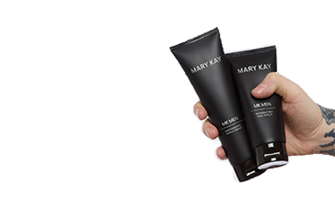 Tattooed wrist with hand holding two Mary Kay MKMen products